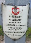 Stanis�aw Ozerbiak upami�tniony na imiennej tablicy epitafijnej na jednym z grob�w w obr�bie kwatery wojennej na cmentarzu parafialnym w Rybnie. Stan z dn. 02. 06. 2005 r. (fot. Marcin Prengowski).